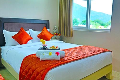 Postel nebo postele na pokoji v ubytování Athena Hotel