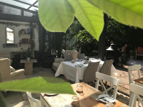 a dining room with a table and chairs at JustB Edinburgh in Edinburgh