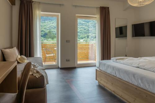 Posteľ alebo postele v izbe v ubytovaní O_live Agriresort