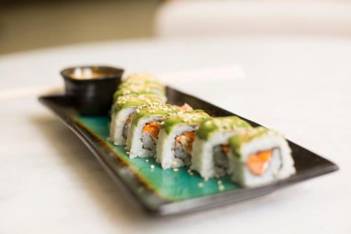 a plate of sushi on a white table at Radisson Hotel Panama Canal in Panama City
