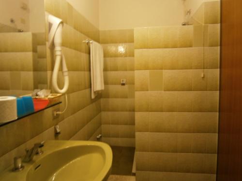 Koupelna v ubytování Hotel Chiara