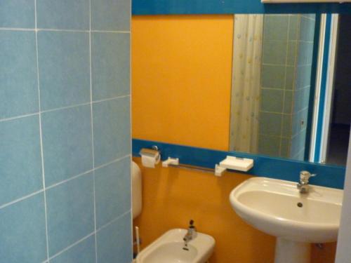 Ένα μπάνιο στο Baia Arcile Case Vacanza