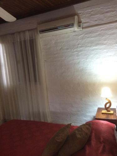 Una cama o camas en una habitación de Hotel Del Pasaje
