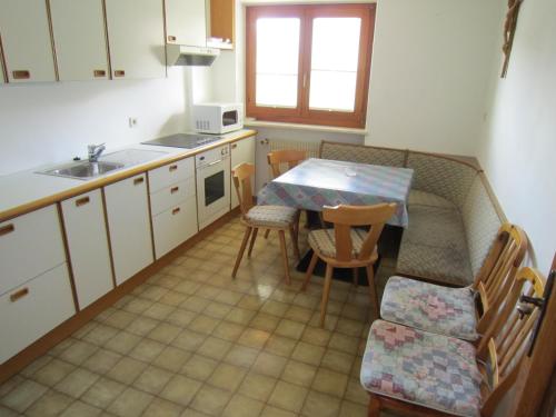 Η κουζίνα ή μικρή κουζίνα στο Aparthotel Garni Haus Hubertus