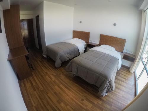 Katil atau katil-katil dalam bilik di Hotel Ceynes Cajamarca