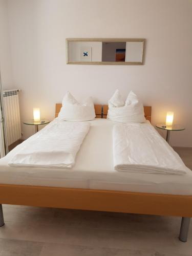 Krevet ili kreveti u jedinici u objektu Guest House Mare e Monti