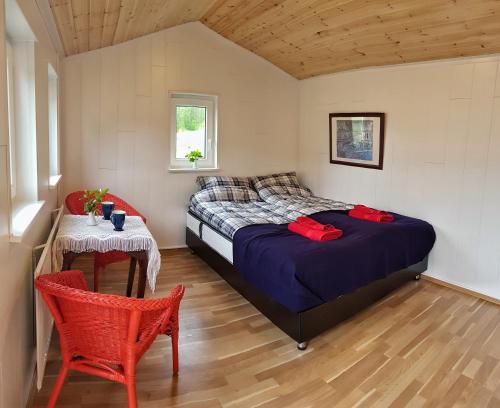 Llit o llits en una habitació de Ravencliff Lodge