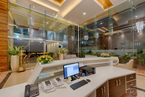 an office with a desk with a computer on it at Hotel Lance International in Nāgercoil