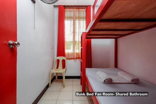 Cama o camas de una habitación en Stay Malate (Wanderers Guest House)