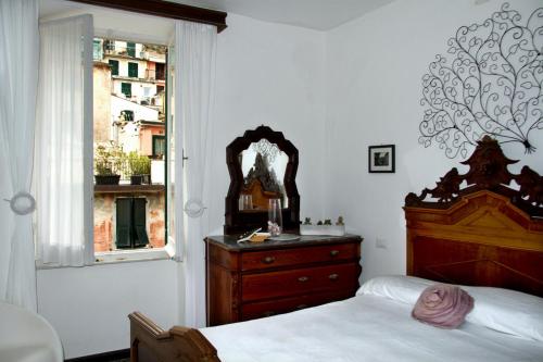Postel nebo postele na pokoji v ubytování Guesthouse Rollando