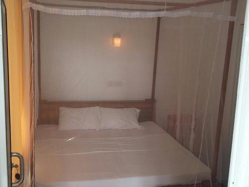 Postel nebo postele na pokoji v ubytování Ameesha guesthouse