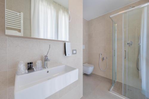 Ванная комната в Hotel Delfino Venezia Mestre