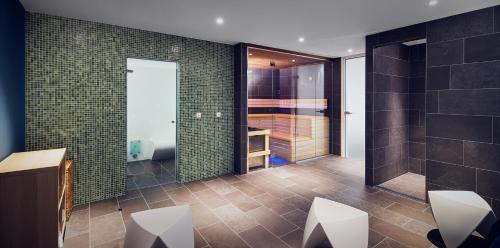 Een badkamer bij Inntel Hotels Amsterdam Centre