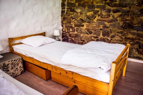 Кровать или кровати в номере La Retirée