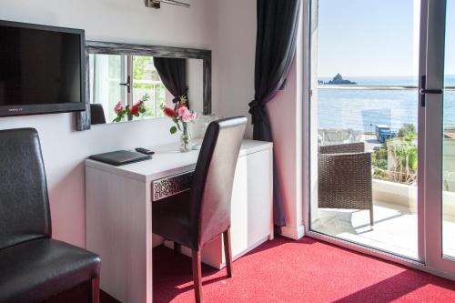 TV a/nebo společenská místnost v ubytování Vile Oliva Hotel & Resort