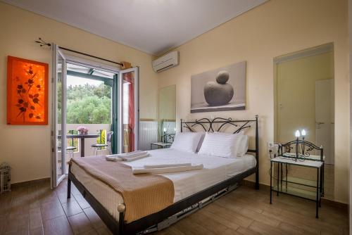 Posteľ alebo postele v izbe v ubytovaní Ionian Villas