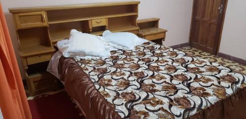 Katil atau katil-katil dalam bilik di Hotel Santusa