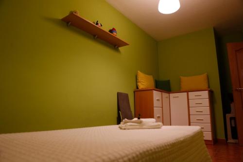 Katil atau katil-katil dalam bilik di PISO EXTERIOR COMPLETO A 20 ' DE BARCELONA.