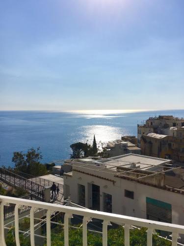a view of the ocean from a building at Hotel Villa Delle Palme in Positano in Positano