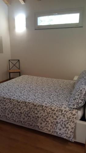 Säng eller sängar i ett rum på Apartment Regina Uno