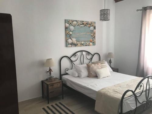 A bed or beds in a room at Blue Island