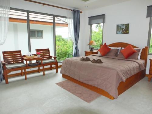 Una cama o camas en una habitación de SODA POP Samui pool villa