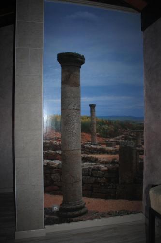 a view through a window of a building at Apartamentos Numancia in Garray