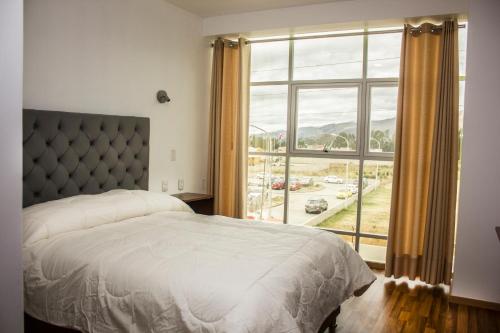 Katil atau katil-katil dalam bilik di Hotel Ceynes Cajamarca