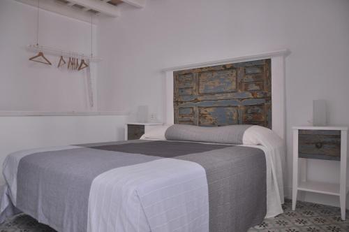מיטה או מיטות בחדר ב-Vivienda Turistica de Alojamiento Rural Cilla Vieja 11