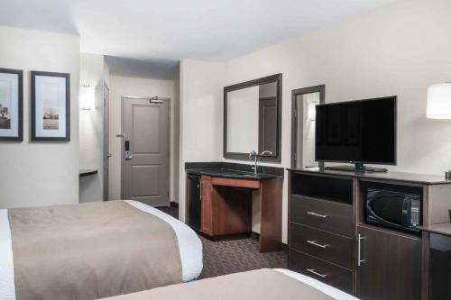 A television and/or entertainment center at AmericInn by Wyndham Windom