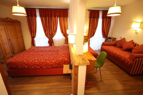 Кровать или кровати в номере Hotel Trieste
