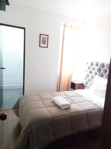 Katil atau katil-katil dalam bilik di Hotel Ceynes Cajamarca