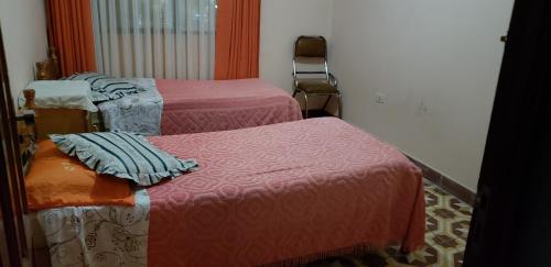 Katil atau katil-katil dalam bilik di Hotel Santusa