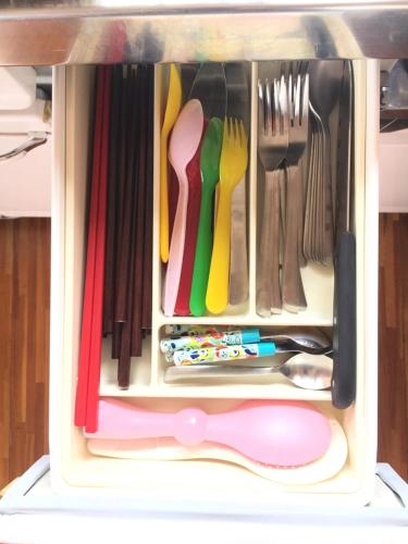 a drawer filled with utensils and a spatula at Endless Summer Okinawa North in Okinawa City