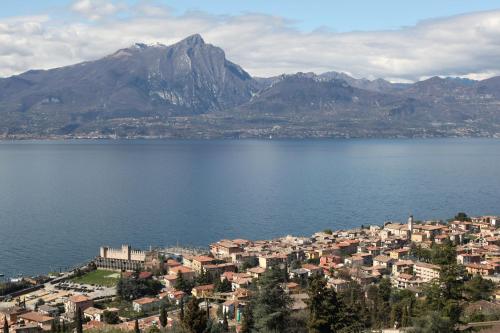 a town on the shore of a large body of water at Albergo Del Garda in Torri del Benaco