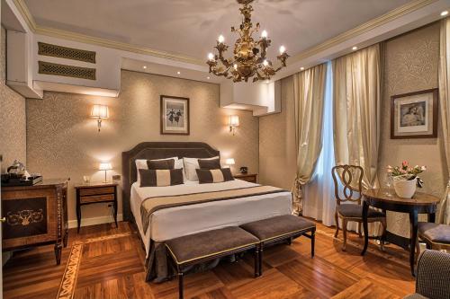 Кровать или кровати в номере Londra Palace Venezia