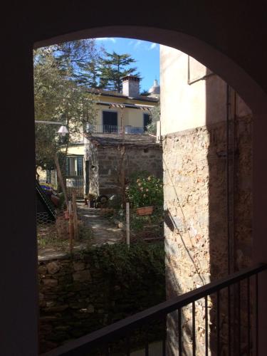 a view of a building from a window at Appartamento vacanze "Borgo Cinque Terre" Volastra Manarola in Volastra