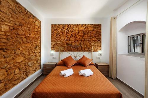 Tempat tidur dalam kamar di Vejer life&nature