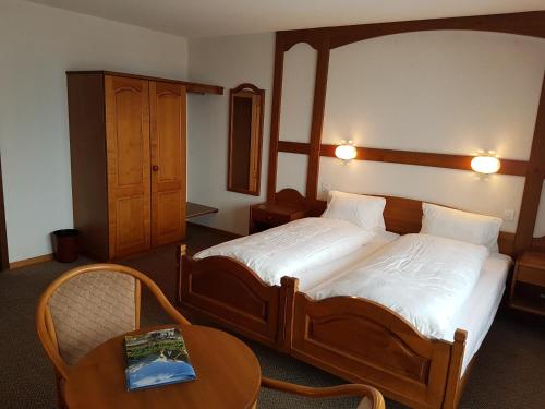 Postel nebo postele na pokoji v ubytování Hotel Central