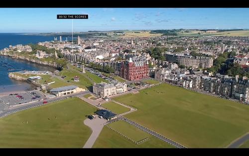 
a large body of water with a city at Modern luxury 2 bed with a view in St. Andrews
