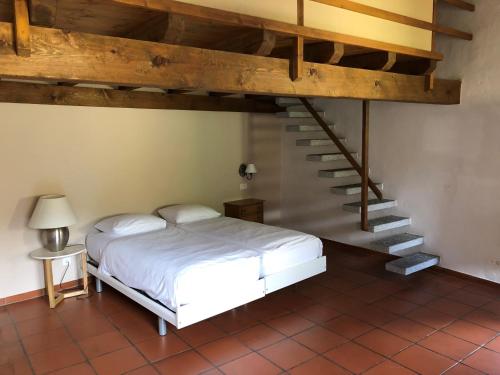 Un pat sau paturi într-o cameră la Al Faro