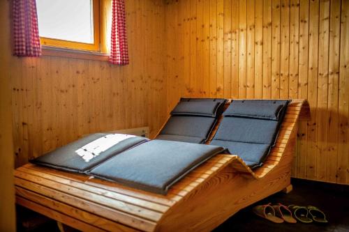 Cama ou camas em um quarto em Almhütte in Kärnten