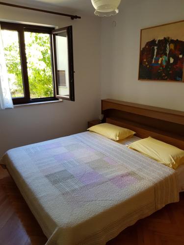 Krevet ili kreveti u jedinici u okviru objekta Apartment Monfiorenzo 11
