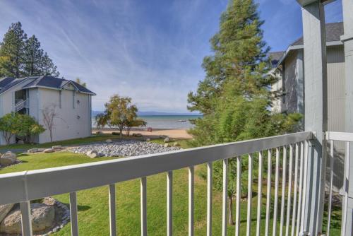 a view of the beach from the balcony of a house at Beach Retreat & Lodge at Tahoe in South Lake Tahoe