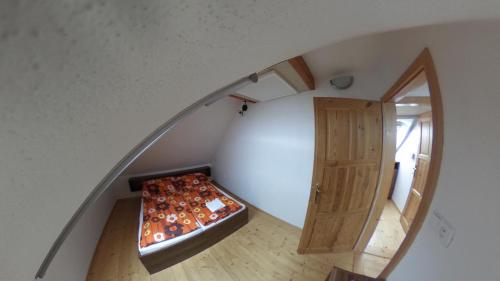an overhead view of a stairway with a wooden door at Ubytování Mikulov in Mikulov