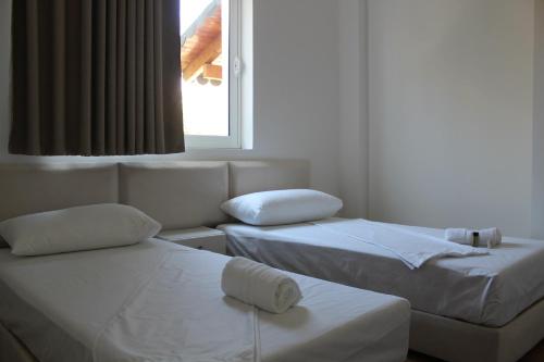 Cama o camas de una habitación en Hotel Myrtaj