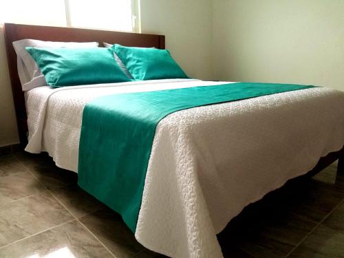 Postel nebo postele na pokoji v ubytování Hotel Villa Turquesa