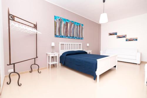 Katil atau katil-katil dalam bilik di Alchimia Apartment