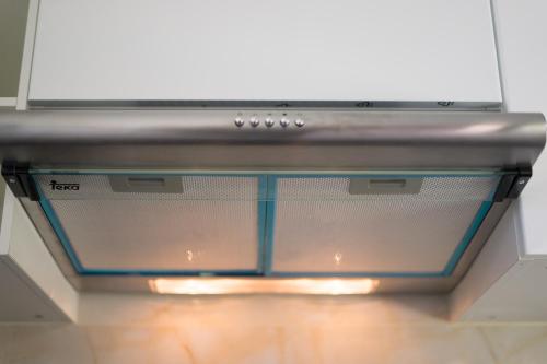 a close up of a kitchen hood at Good Night Pool Villa Phuket - SHA Plus in Phuket Town