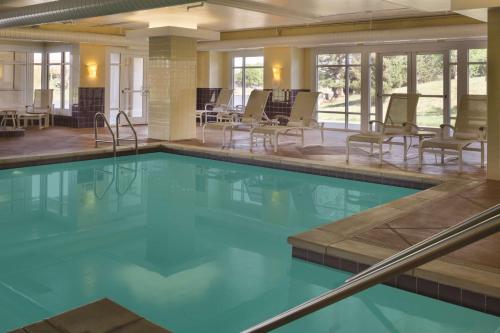 a large swimming pool in a hotel room at Hyatt Regency Wichita in Wichita